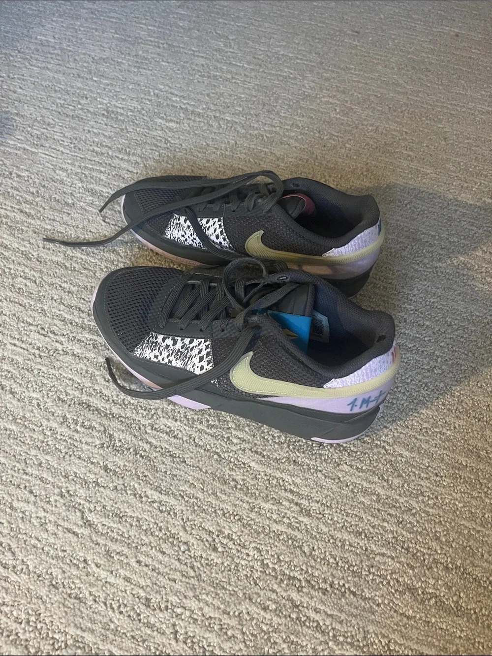 Nike Kids Black basketball shoes with Lavender and Pale Yellow Accents